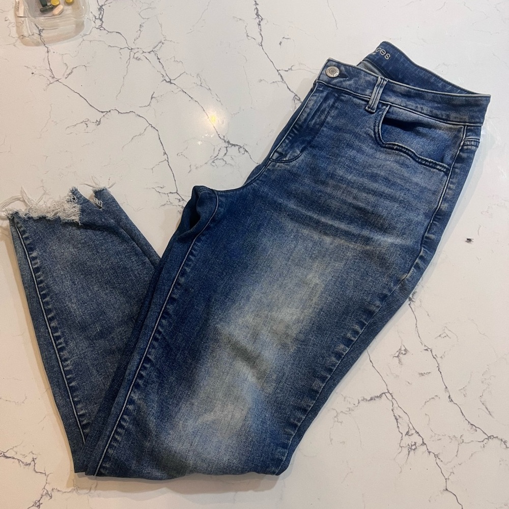 Maurice’s high rise denim jegging with shark bite hem size Large